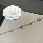 ??MIRA?¡¥STAR AND SUN 4 MOTIFS GOLD DIAMONDS BRACELET
