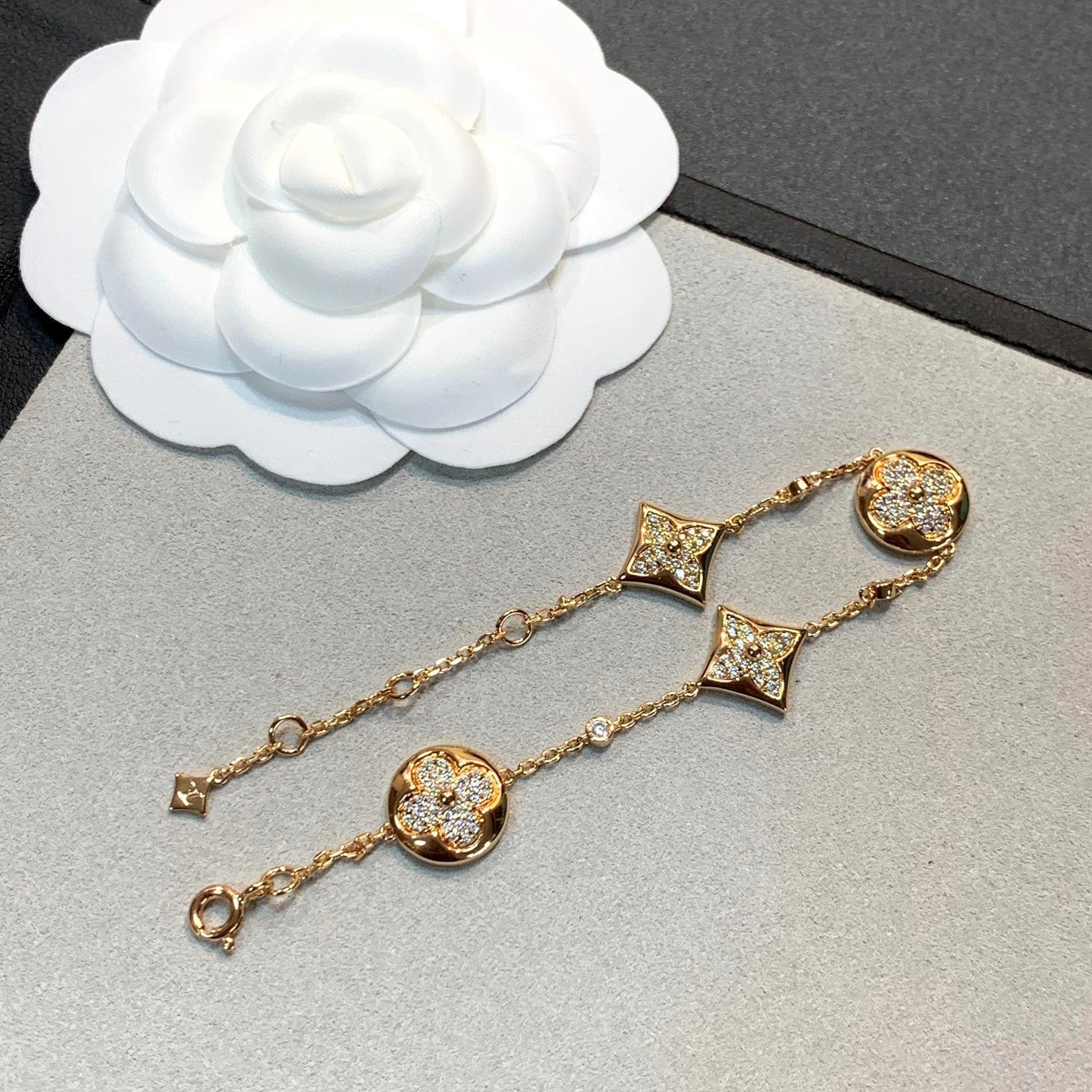??MIRA?¡¥STAR AND SUN 4 MOTIFS GOLD DIAMONDS BRACELET