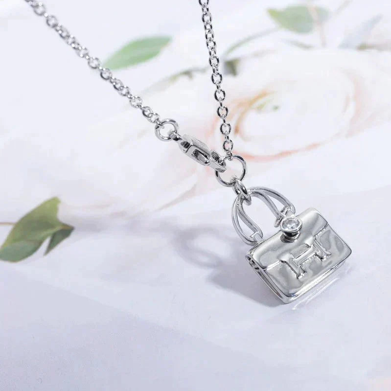 ??MIRA?¡¥AMULETTE PEDANT SILVER NECKLACE