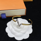 ??MIRA?¡¥VOLTE UPSITE DOWN DIAMOND GOLD OPEN BRACELET