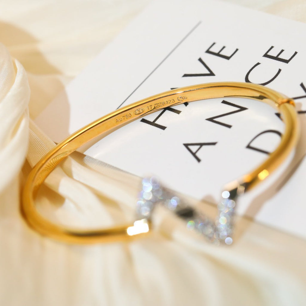 ??MIRA?¡¥VOLTE UPSITE DOWN GOLD DIAMOND BRACELET