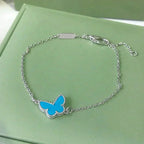 ??MIRA?¡¥BUTTERFLY TURQUOISE BUTTERFLY BRACELET SILVER