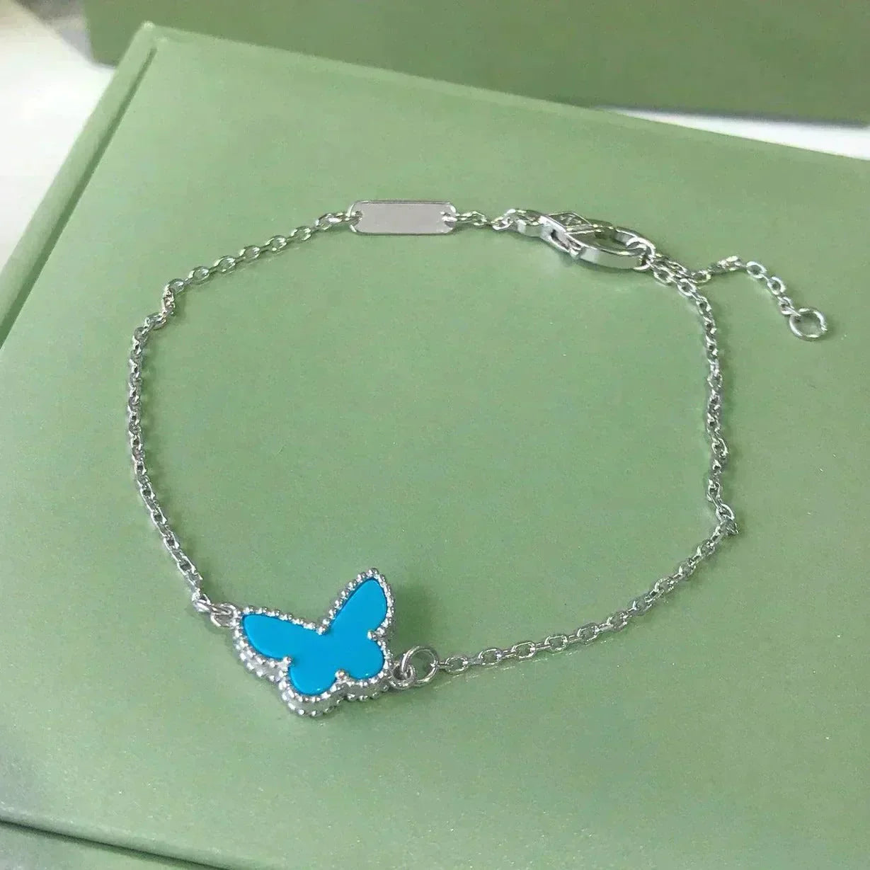 ??MIRA?¡¥BUTTERFLY TURQUOISE BUTTERFLY BRACELET SILVER