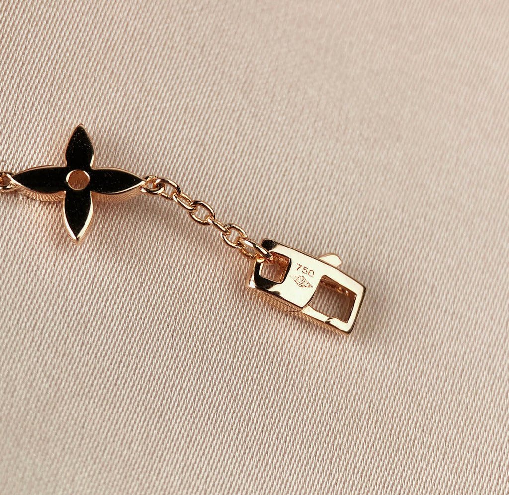 ??MIRA?¡¥STAR AND SUN 7 MOTIFS GOLD BRACELET