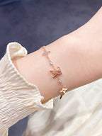 ??MIRA?¡¥STAR AND SUN 7 MOTIFS GOLD BRACELET