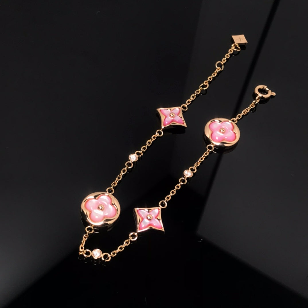 ??MIRA?¡¥STAR AND SUN 4 MOTIF PINK MOP PINK GOLD BRACELET