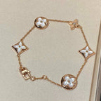 ??MIRA?¡¥STAR AND SUN 5 MOTIF MOP PINK GOLD BRACELET