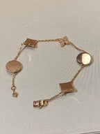 ??MIRA?¡¥STAR AND SUN 5 MOTIF MOP PINK GOLD BRACELET