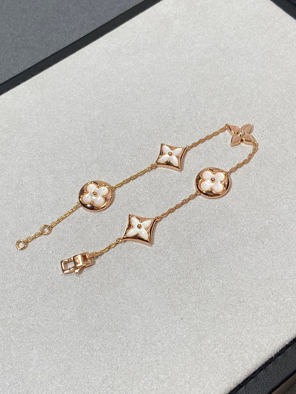 ??MIRA?¡¥STAR AND SUN 5 MOTIF MOP PINK GOLD BRACELET