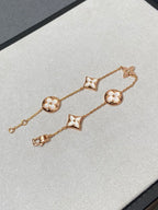 ??MIRA?¡¥STAR AND SUN 5 MOTIF MOP PINK GOLD BRACELET
