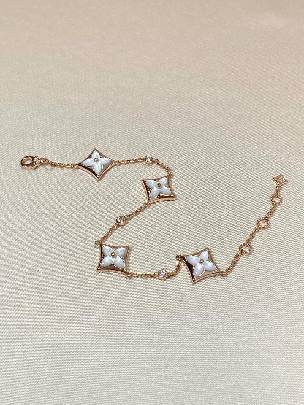 ??MIRA?¡¥STAR 4 MOTIF MOP DIAMOND PINK GOLD BRACELET