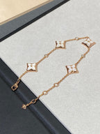 ??MIRA?¡¥STAR 4 MOTIF MOP DIAMOND PINK GOLD BRACELET