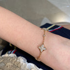 ??MIRA?¡¥STAR AND SUN 4 MOTIF WHITE MOP PINK GOLD BRACELET