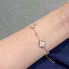 ??MIRA?¡¥STAR AND SUN 4 MOTIF WHITE MOP PINK GOLD BRACELET