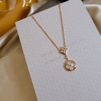 ??MIRA?¡¥STAR AND SUN WHITE MOP 2 MOTIF PINK GOLD NECKLACE