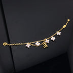 ??MIRA?¡¥LOGO 6 MOTIF STAR AND SUN GOLD BRACELET