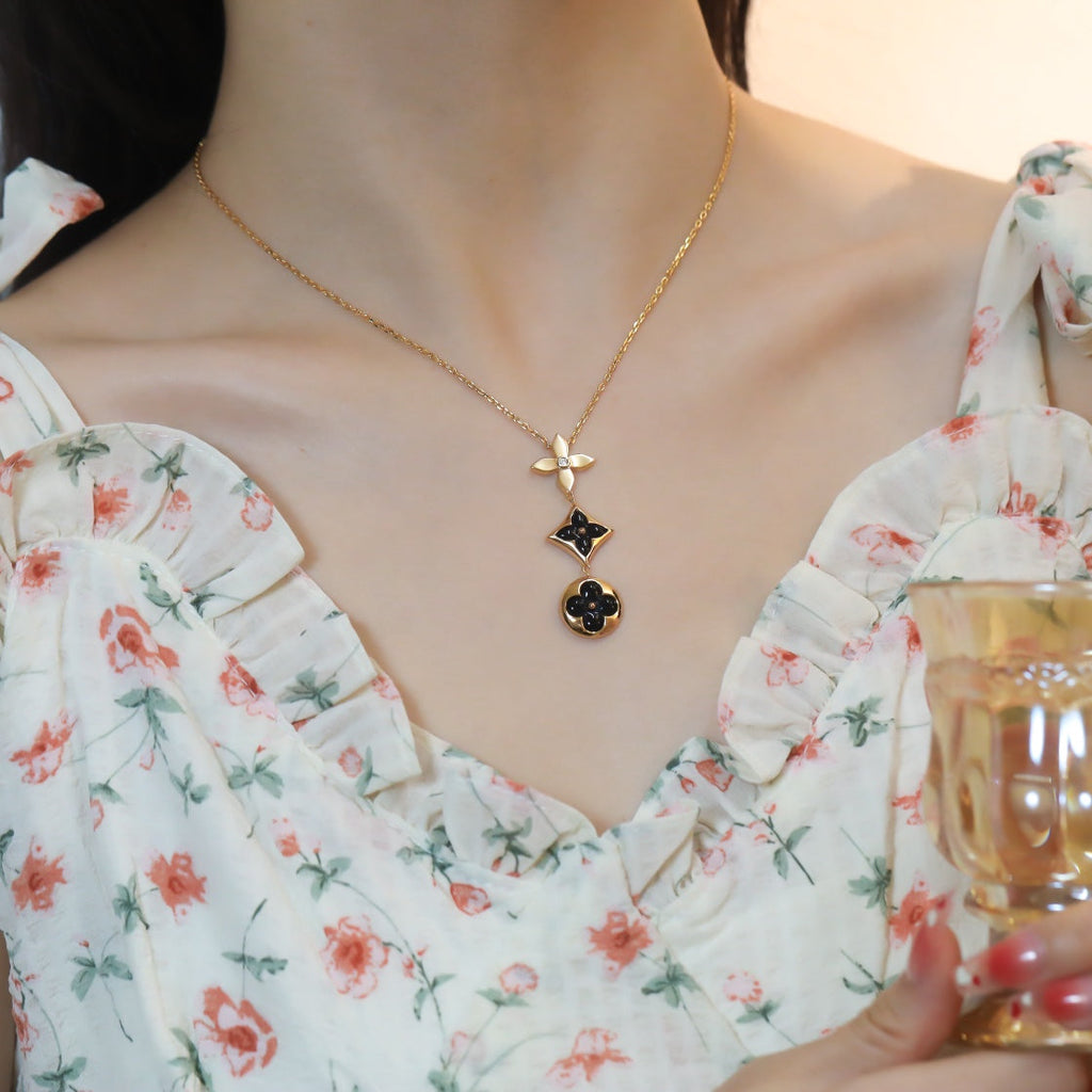 ??MIRA?¡¥STAR AND SUN ONYX PINK GOLD NECKLACE