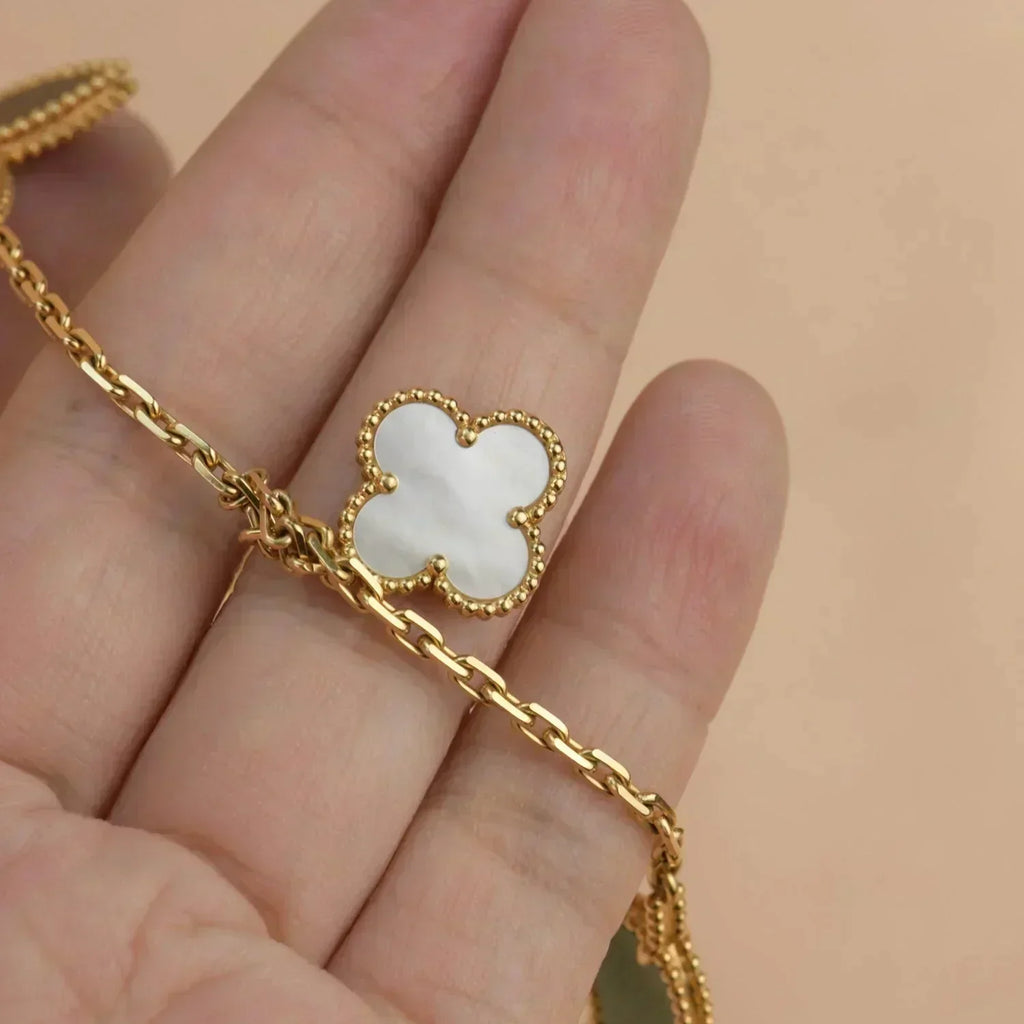 ??MIRA?¡¥LUCKY SPRING 5 MOTIF GOLD BRACELET