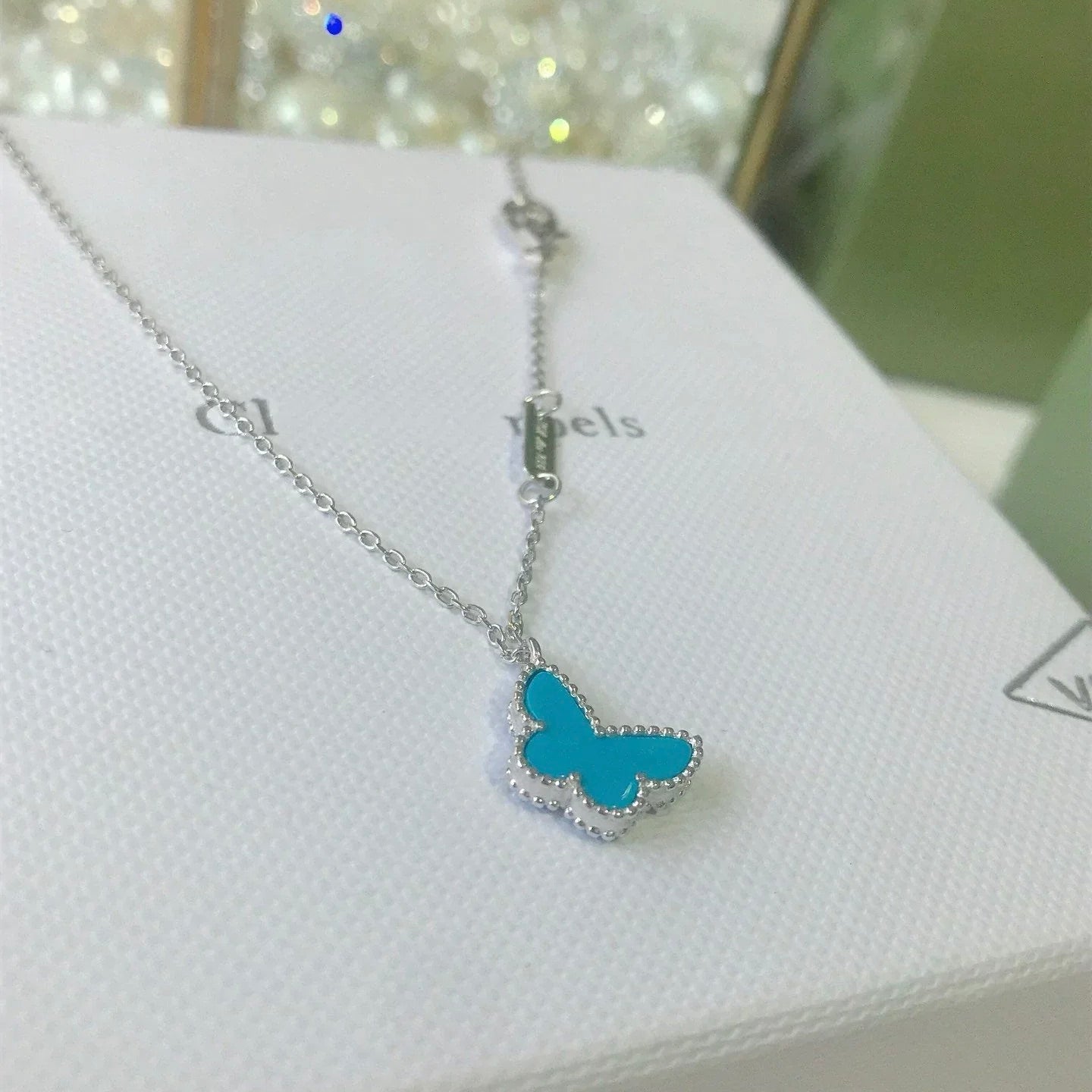 ??MIRA?¡¥BUTTERFLY TURQUOISE BUTTERFLY BRACELET SILVER