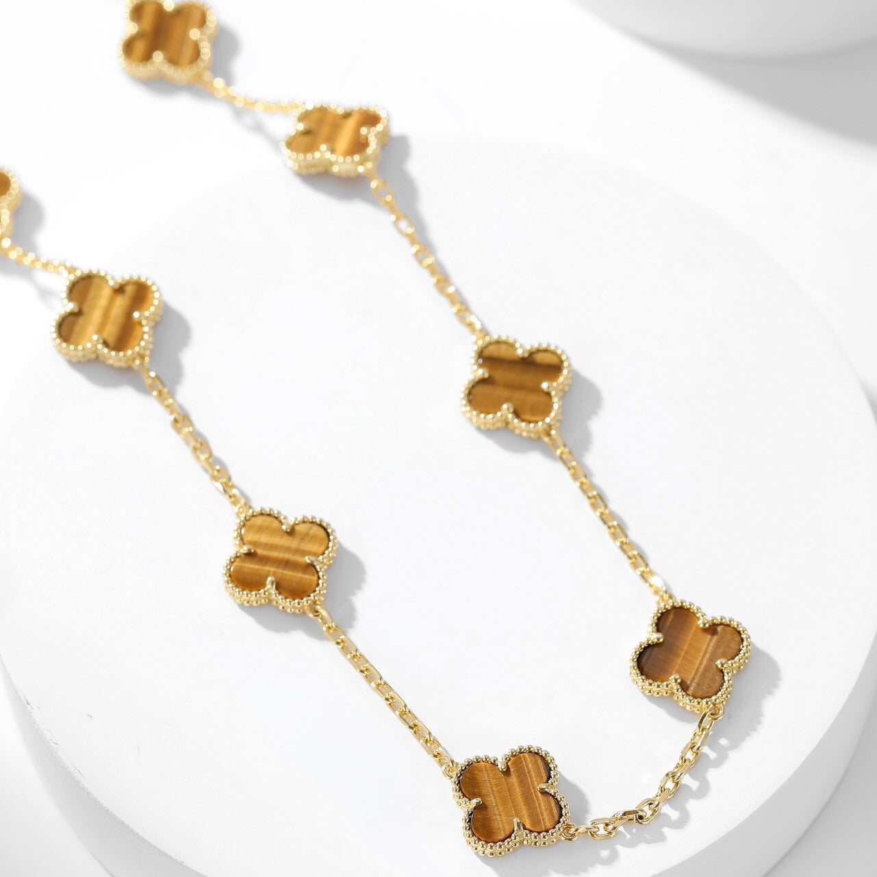 ??MIRA?¡¥CLOVER 10 MOTIFS TIGER EYE NECKLACE