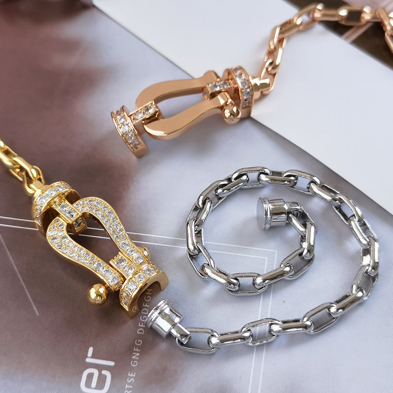 ??MIRA?¡¥FORCE LARGE HORSESHOE CLASP  METAL BRACELET