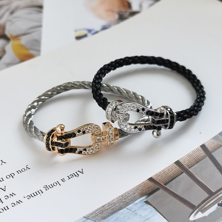 ??MIRA?¡¥FORCE LARGE HORSESHOE BLACK WHITE DIAMOND BRACELET ROSE GOLD