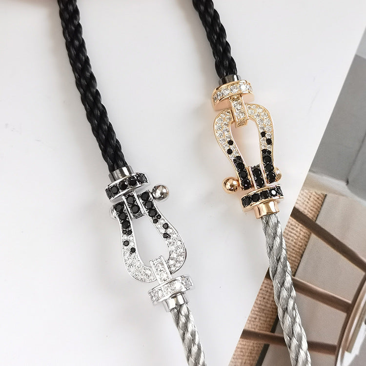 ??MIRA?¡¥FORCE LARGE HORSESHOE BLACK WHITE DIAMOND BRACELET ROSE GOLD