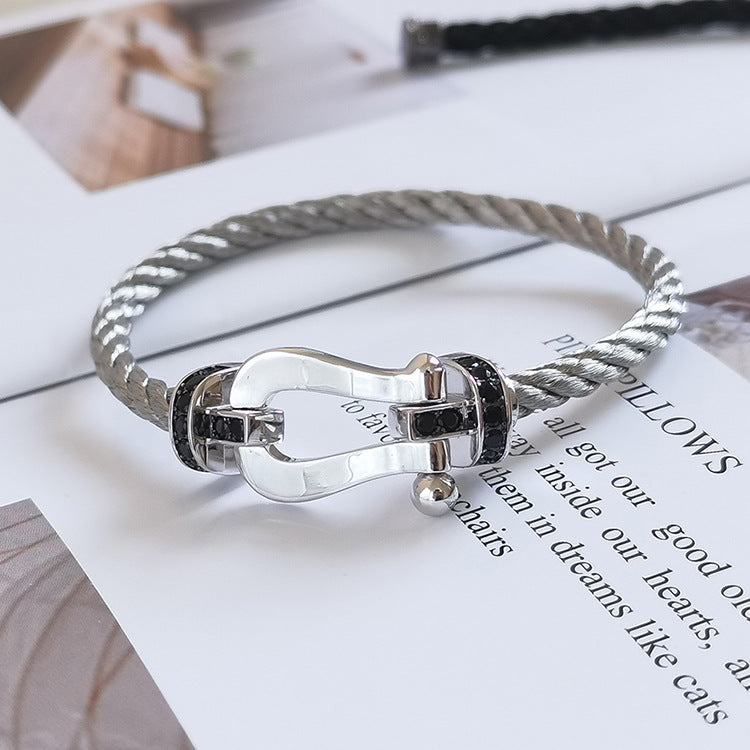 ??MIRA?¡¥FORCE LARGE HORSESHOE BLACK DIAMOND BRACELET SILVER