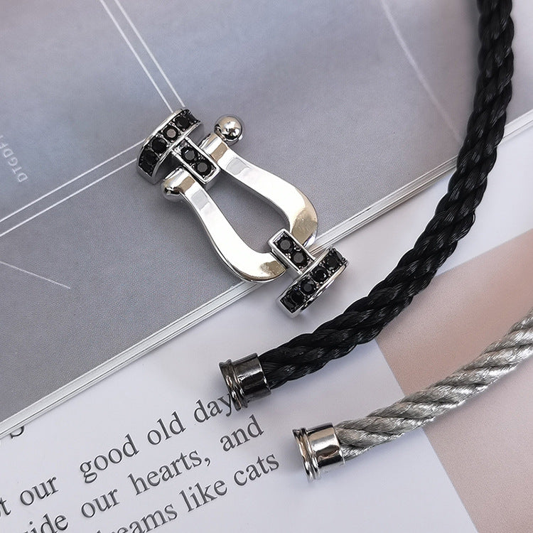 ??MIRA?¡¥FORCE LARGE HORSESHOE BLACK DIAMOND BRACELET SILVER