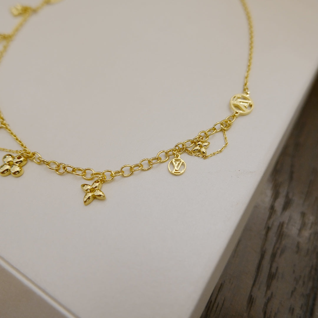 ??MIRA?¡¥BLOOMING SUPPLE NECKLACE BRASS