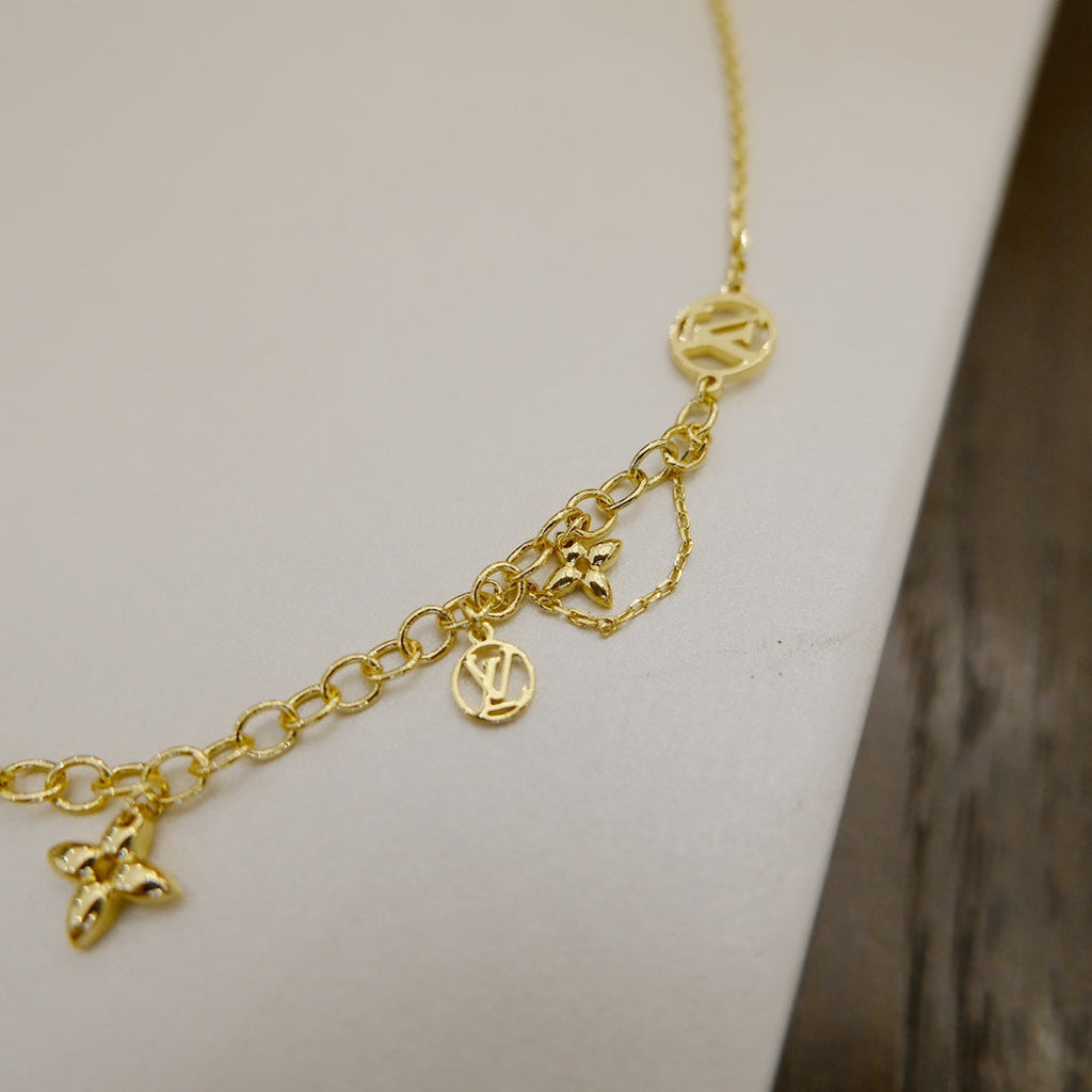 ??MIRA?¡¥BLOOMING SUPPLE NECKLACE BRASS