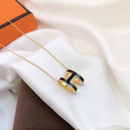 ??MIRA?¡¥HM CLIC BLACK ENAMEL GOLD NECKLACE