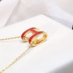 ??MIRA?¡¥HM CLIC RED ENAMEL GOLD NECKLACE
