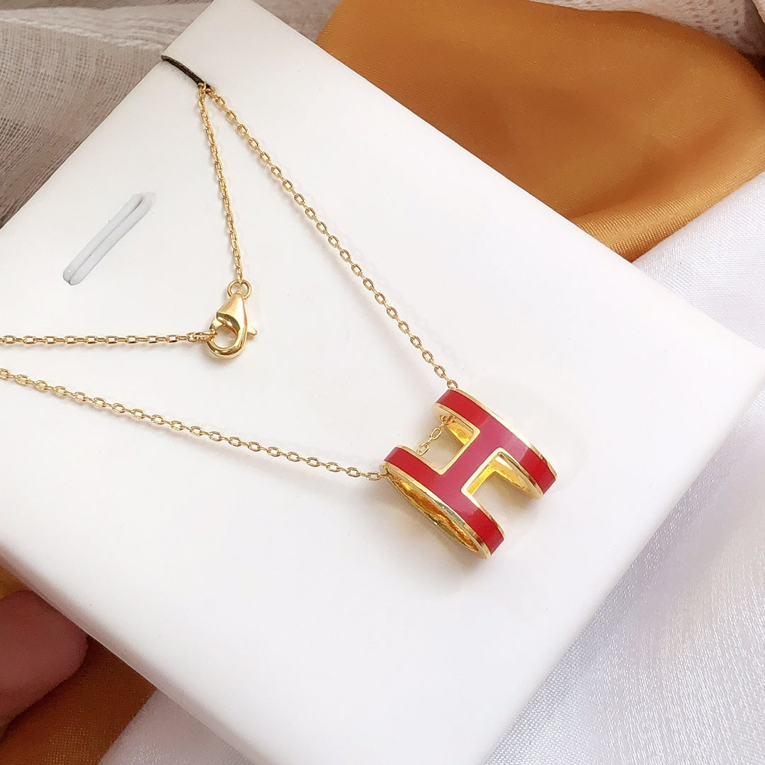 ??MIRA?¡¥HM CLIC RED ENAMEL GOLD NECKLACE