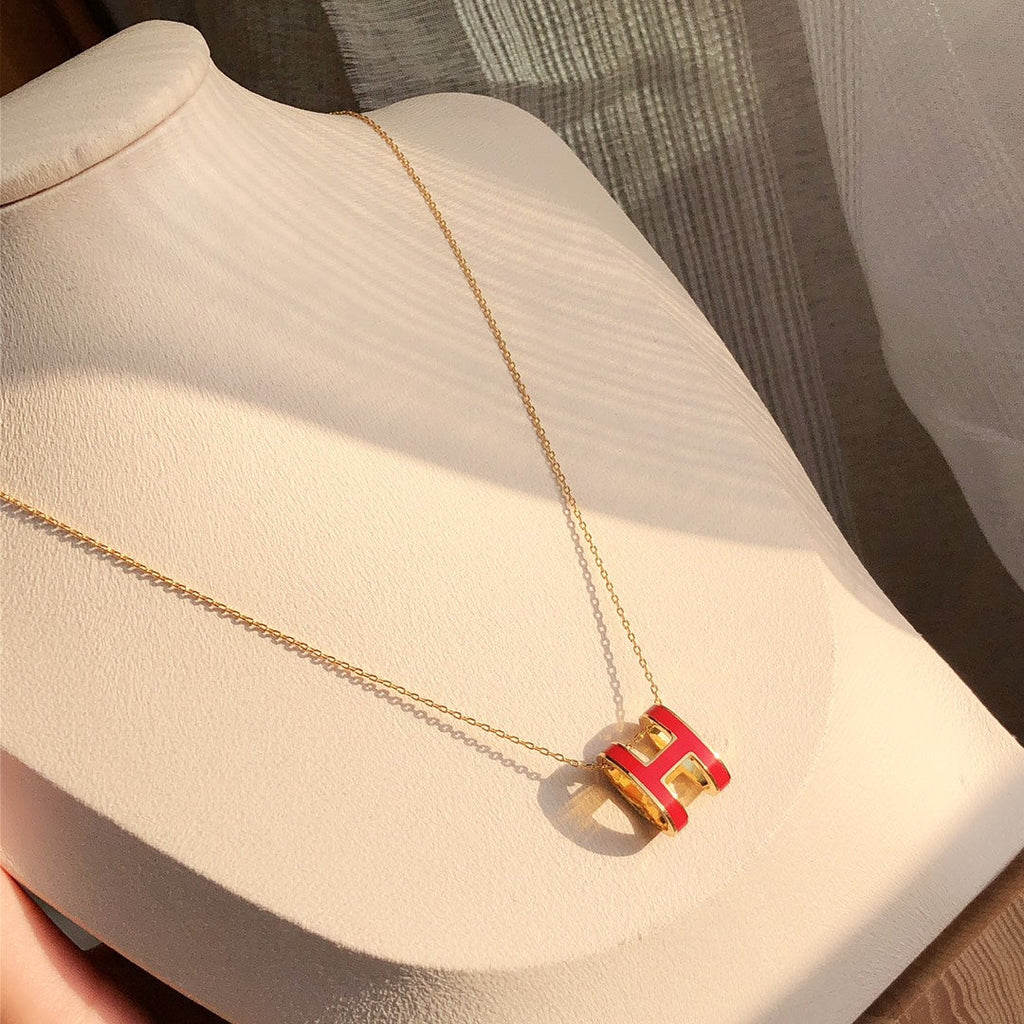 ??MIRA?¡¥HM CLIC RED ENAMEL GOLD NECKLACE