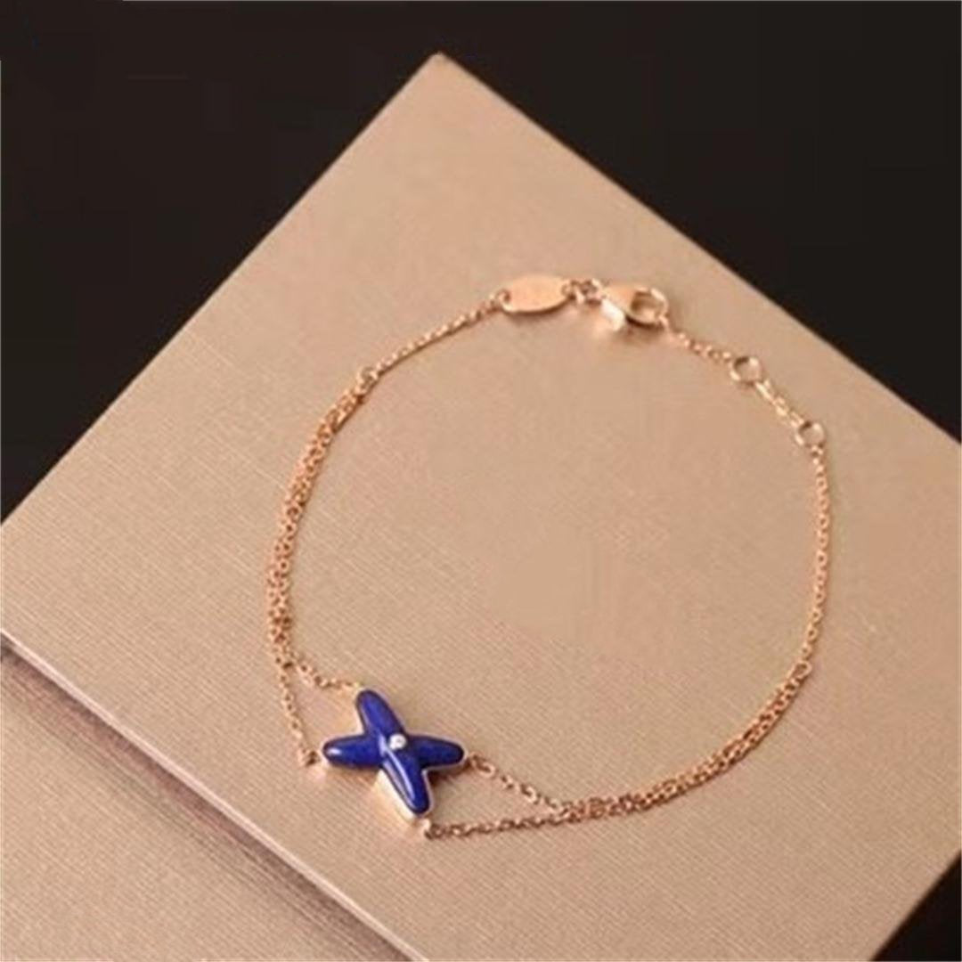 ??MIRA?¡¥Hollow Design Four-Leaf Clover Flower Shape Ring