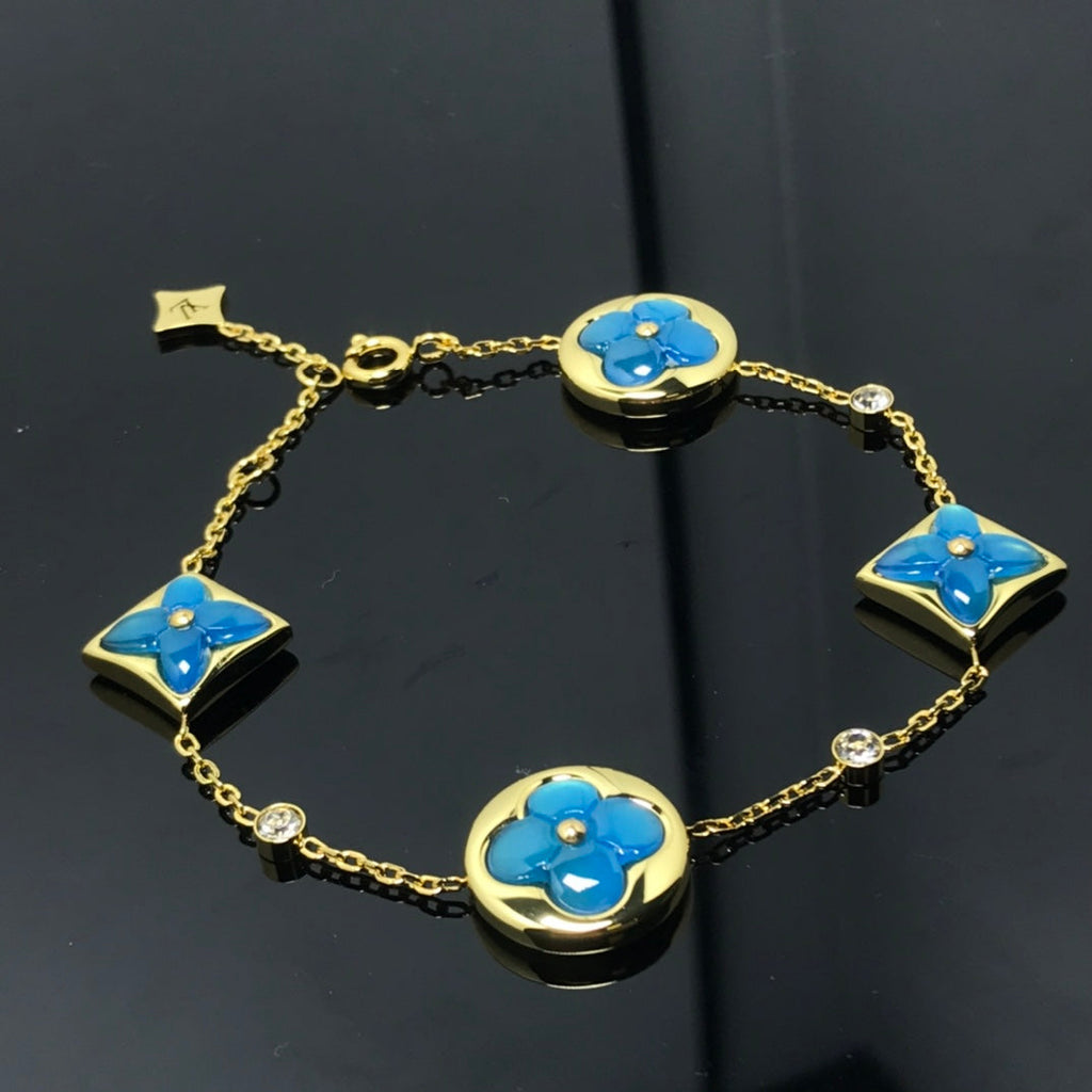 ??MIRA?¡¥STAR AND SUN 4 MOTIF BLUE BRACELET