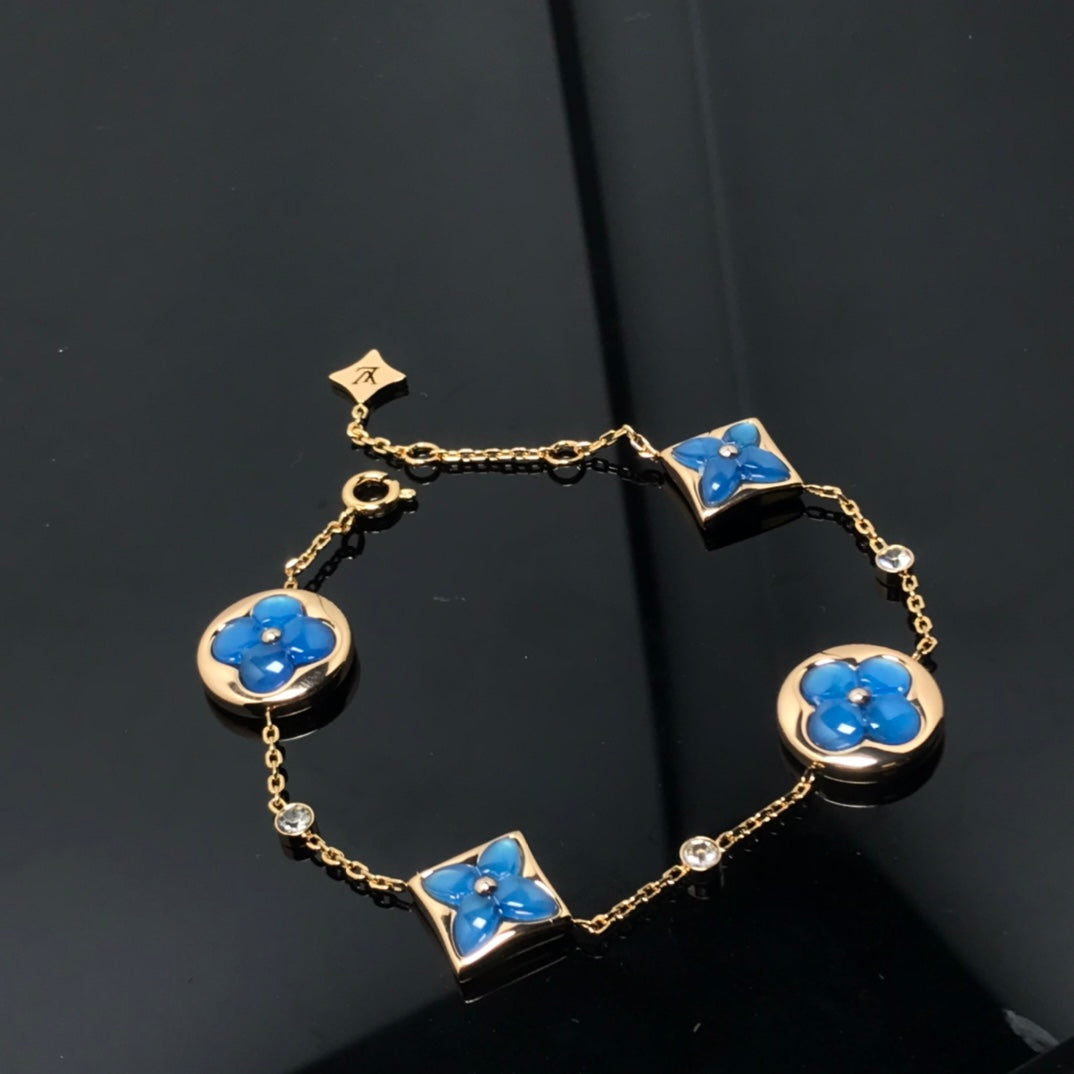??MIRA?¡¥STAR AND SUN 4 MOTIF BLUE BRACELET
